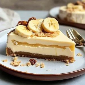 Delicious homemade Banana Cheesecake topped with fresh bananas and whipped cream