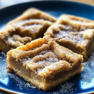 Freshly baked Cinnamon Sugar Blondies with a sprinkle of cinnamon sugar topping