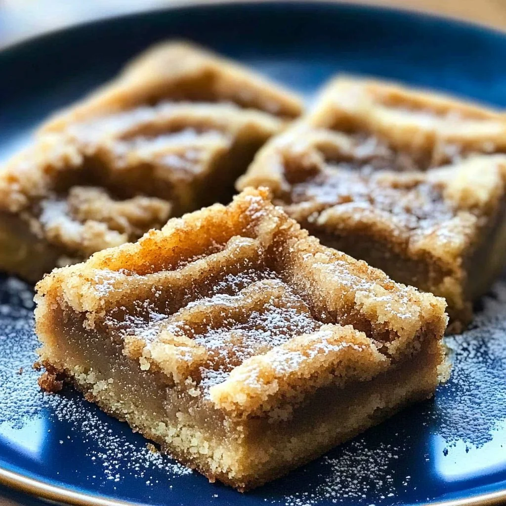 Freshly baked Cinnamon Sugar Blondies with a sprinkle of cinnamon sugar topping