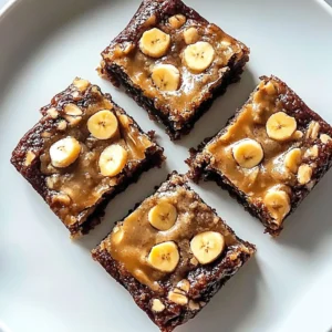 Peanut butter banana bars topped with oats and chocolate chips