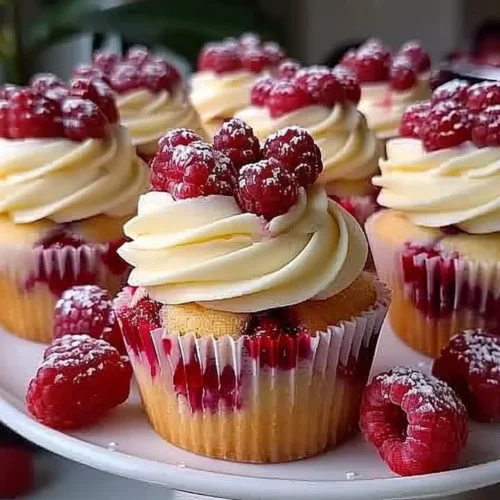 Almond wedding cake cupcakes with raspberry filling for weddings