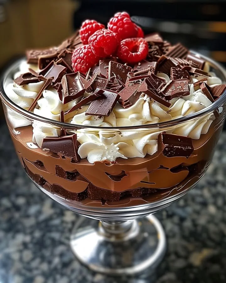 Delicious Baileys chocolate cheesecake trifle layered in a glass dish