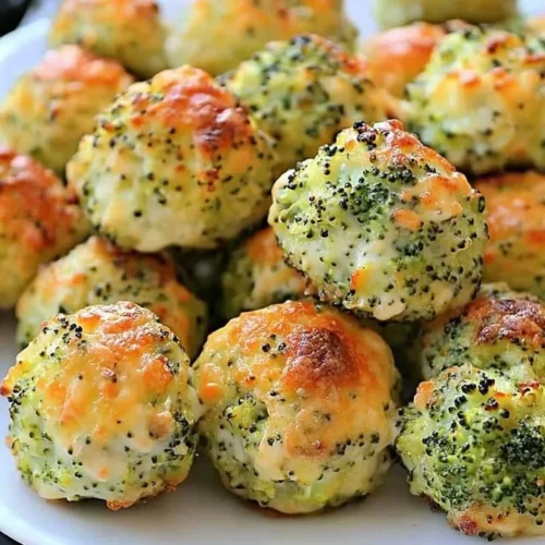Baked broccoli cheese balls fresh out of the oven, crispy and golden.