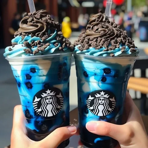 Delicious Blue Cookies & Cream Dip Frappuccino topped with whipped cream
