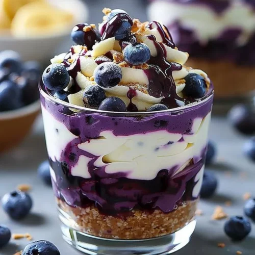 Blueberry cheesecake parfait with layers of cheesecake and blueberries