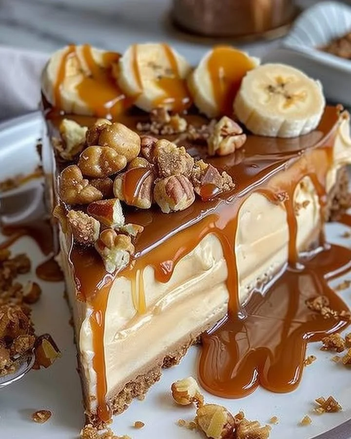Delicious Caramel Banana Cheesecake topped with crunchy caramel bits