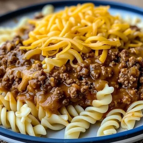 Cheesy Sloppy Cheeseburger Pasta in a bowl, featuring melted cheese and ground beef.