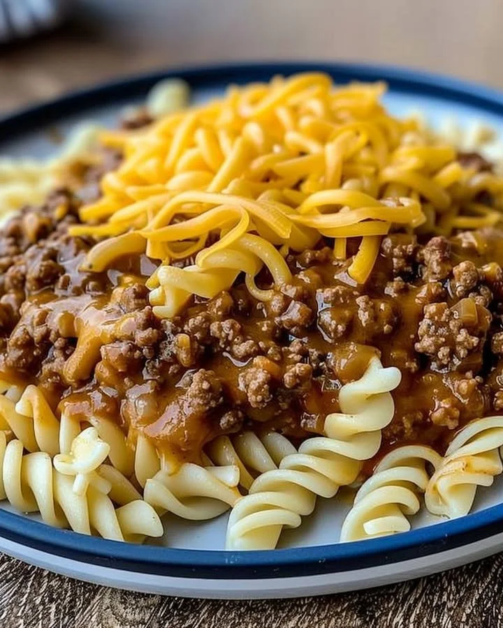 Cheesy Sloppy Cheeseburger Pasta in a bowl, featuring melted cheese and ground beef.