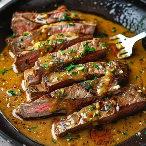Classic pan-seared steak garnished with luscious herb butter