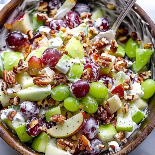 Classic Waldorf Salad with apples, celery, and walnuts served in a bowl