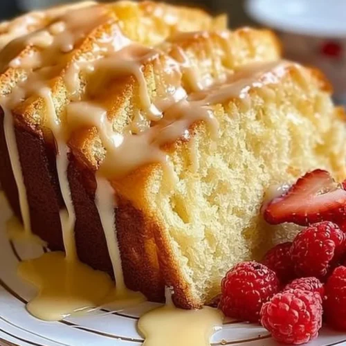 Delicious slice of cream cheese pound cake on a plate.