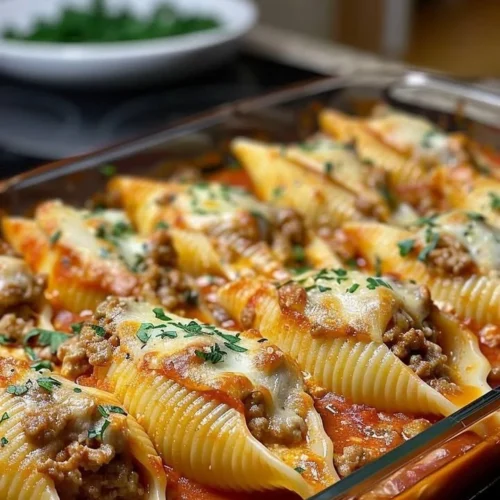 Creamy ricotta beef stuffed shells pasta served in a dish