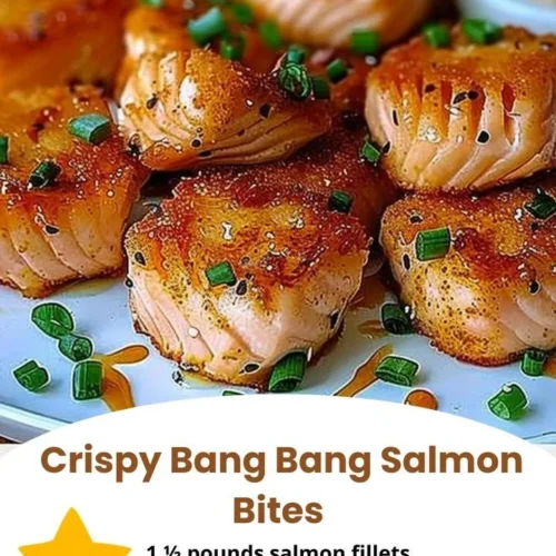 Crispy Bang Bang Salmon bites served with a spicy sauce on a plate