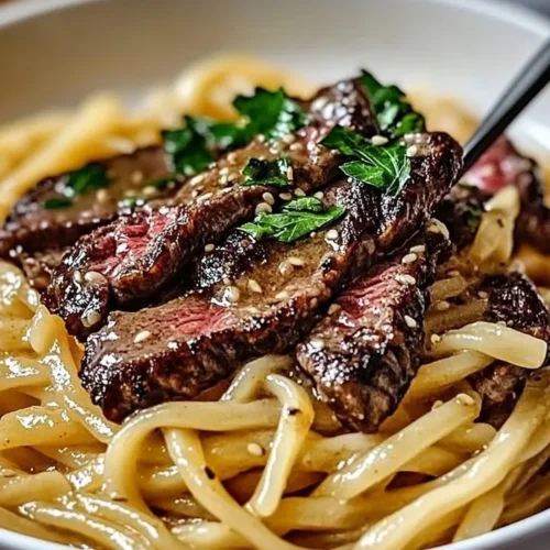 Delicious Garlic Butter Steak served with Lightning Noodles on a plate