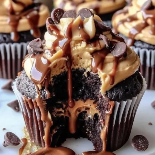 Delicious gooey peanut butter lava cupcakes with melting filling.