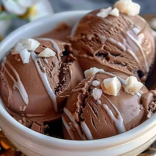 Delicious homemade chocolate ice cream in a bowl with chocolate shavings