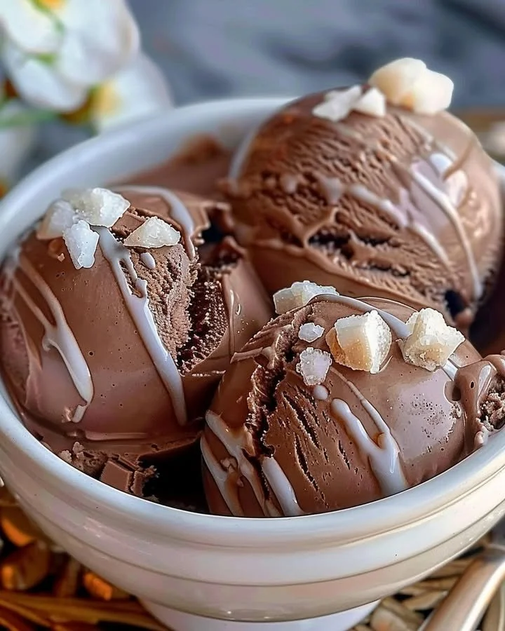 Delicious homemade chocolate ice cream in a bowl with chocolate shavings