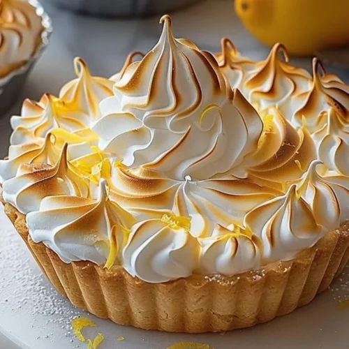 Delicious Lemon Meringue Tart with a golden meringue topping and lemon filling