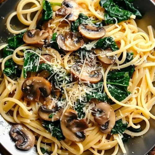 Delicious one pot garlic parmesan pasta topped with herbs and cheese