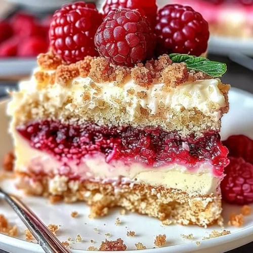 Slice of Raspberry Cream Cheese Coffee Cake on a plate