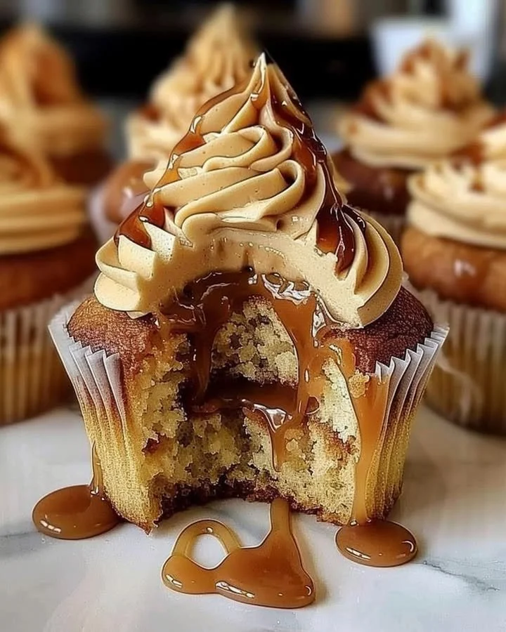 Delicious salted caramel cupcakes topped with creamy frosting and sea salt