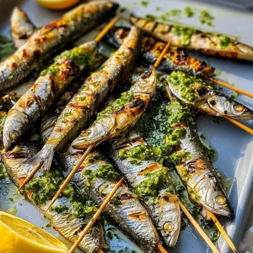 Deliciously grilled sardine skewers served on a wooden platter