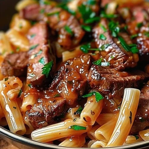 Spicy Honey BBQ Steak Pasta dish in a skillet