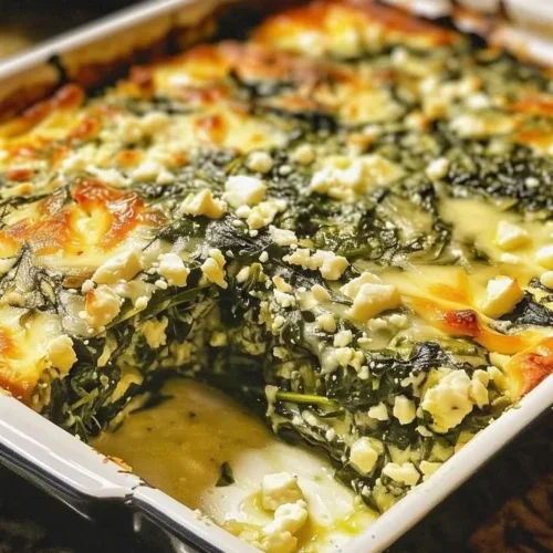 Delicious spinach casserole baked with feta cheese and herbs