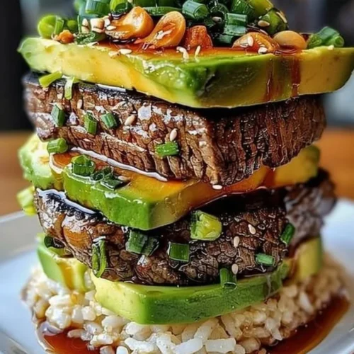 Delicious Teriyaki Beef served on a bed of Avocado Rice Stack