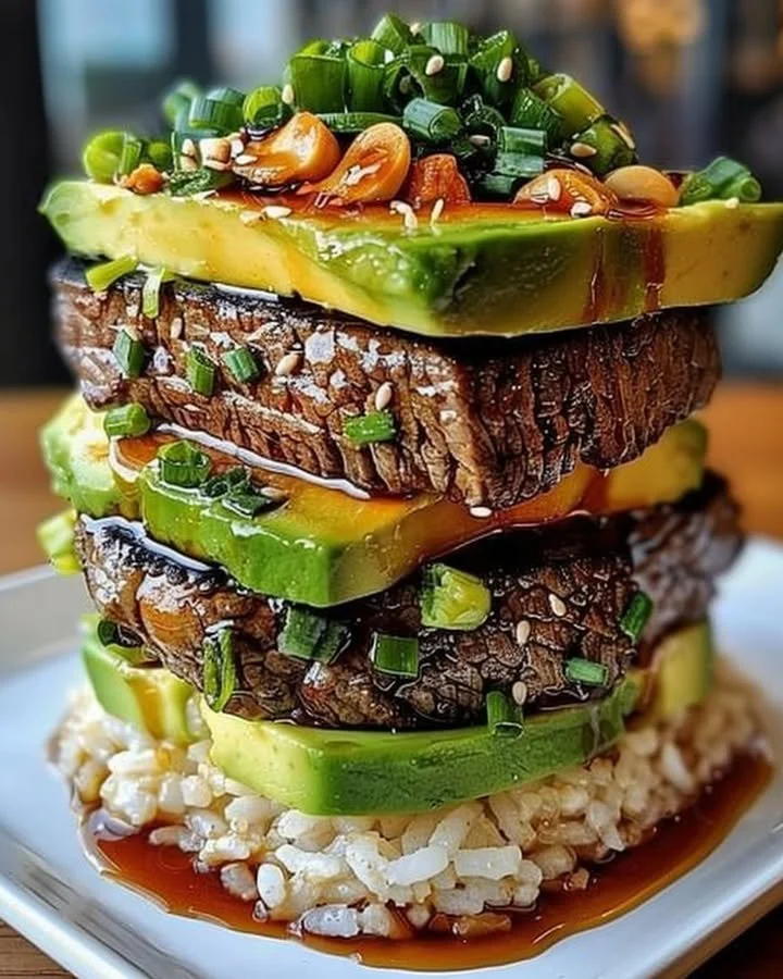 Delicious Teriyaki Beef served on a bed of Avocado Rice Stack