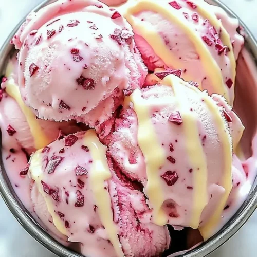 Delicious velvet ice cream with white chocolate drizzles